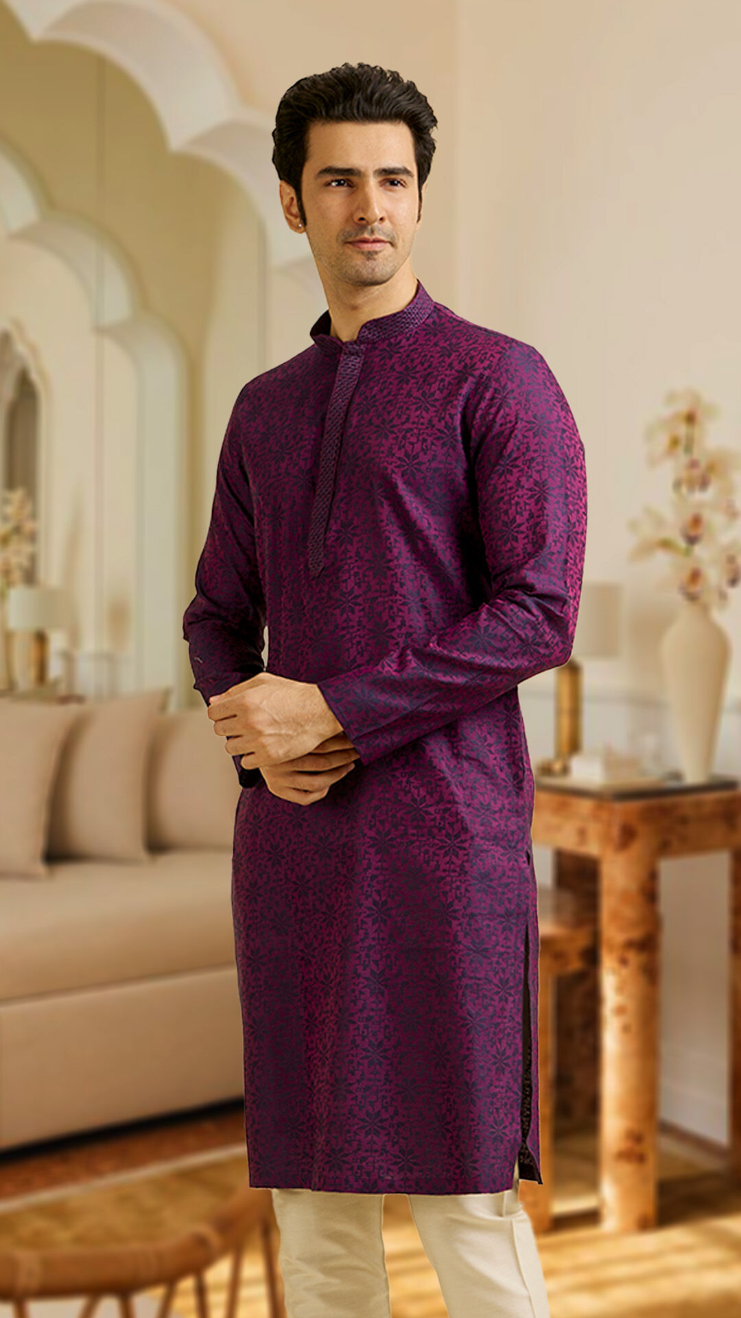 A man wearing printed purple kurta 